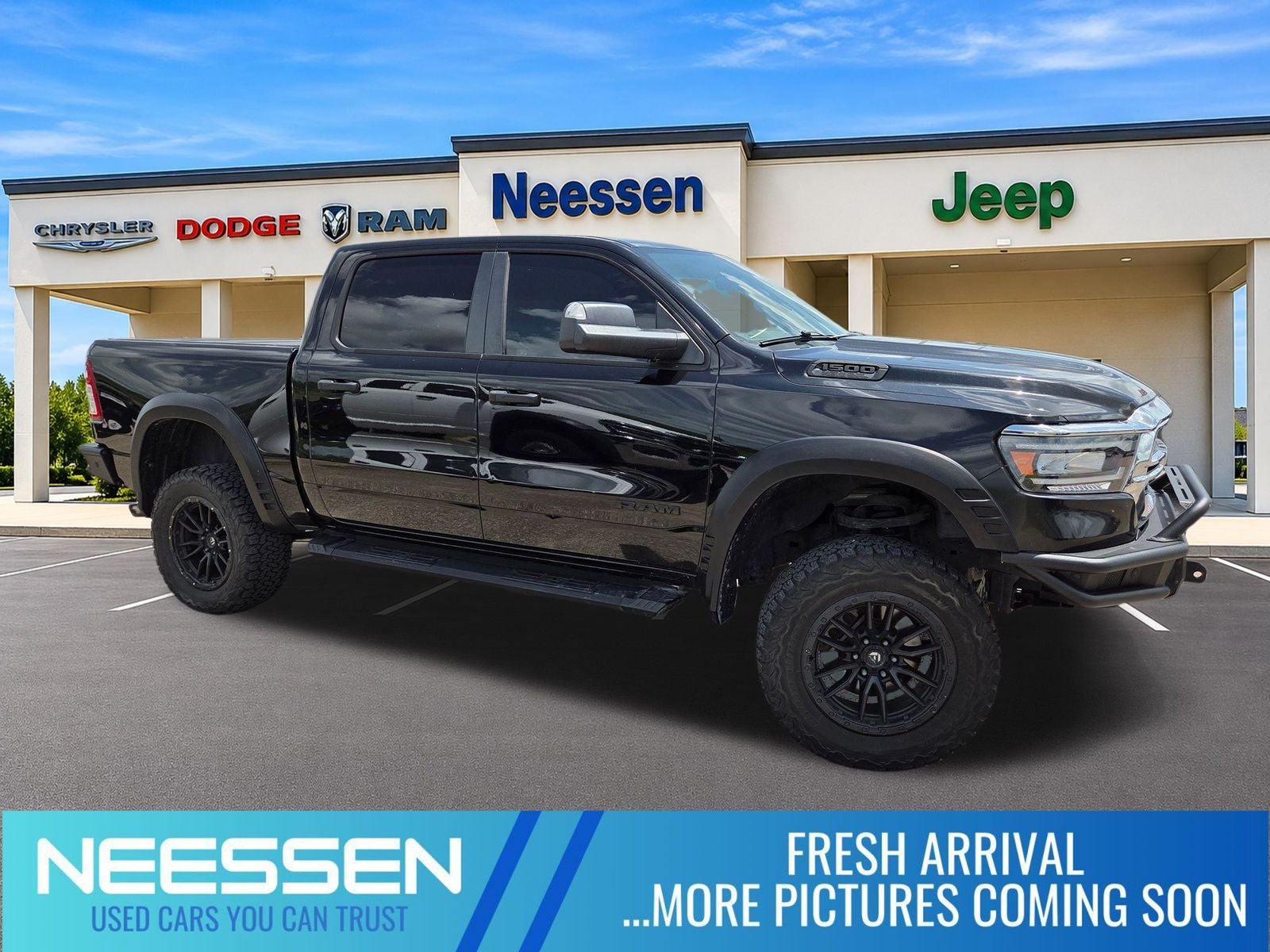 2020 RAM 1500 Tradesman in Diamond Black — front three-quarter view