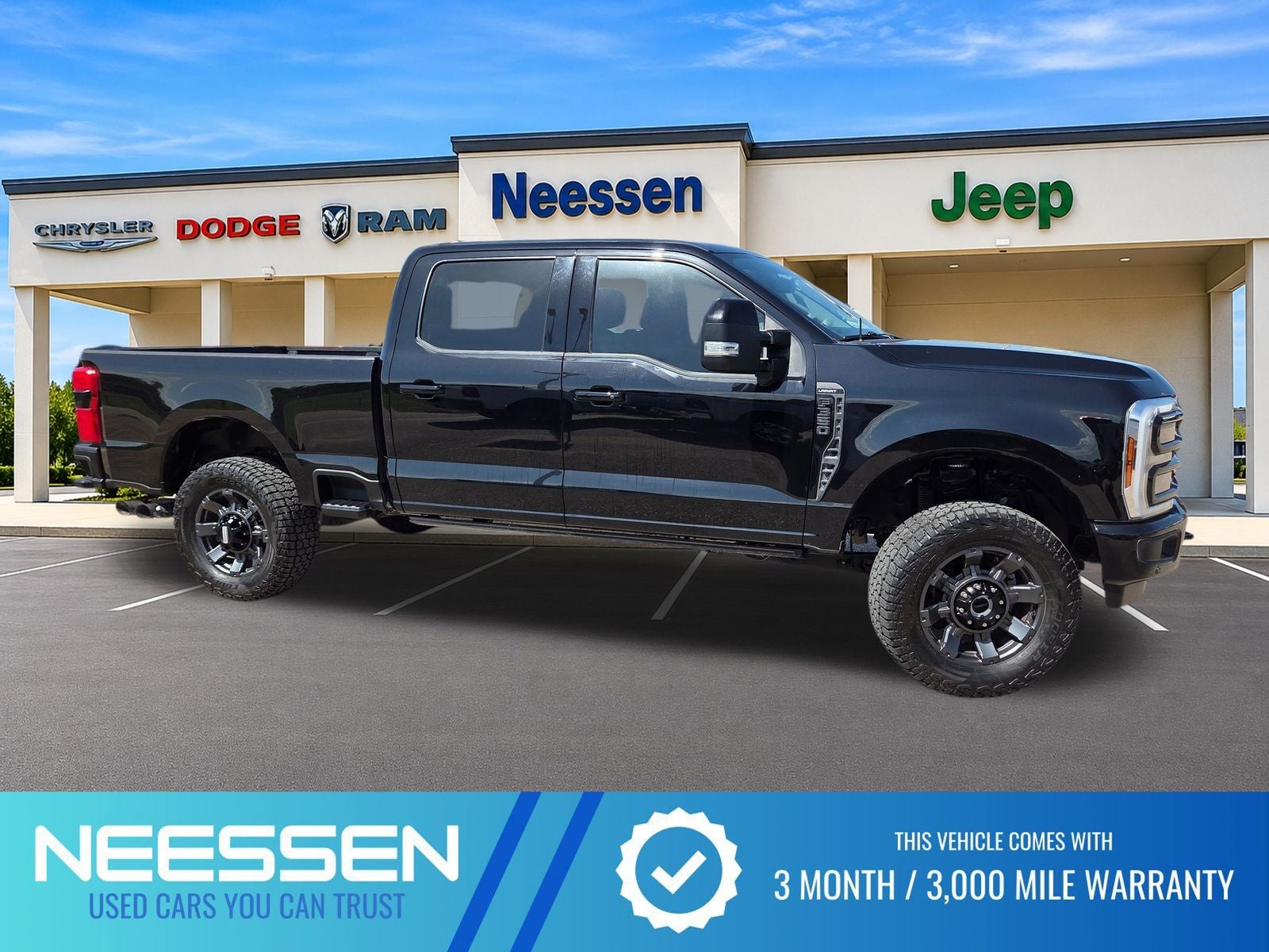 2024 Ford F-350SD Lariat in Black Metallic — front three-quarter view