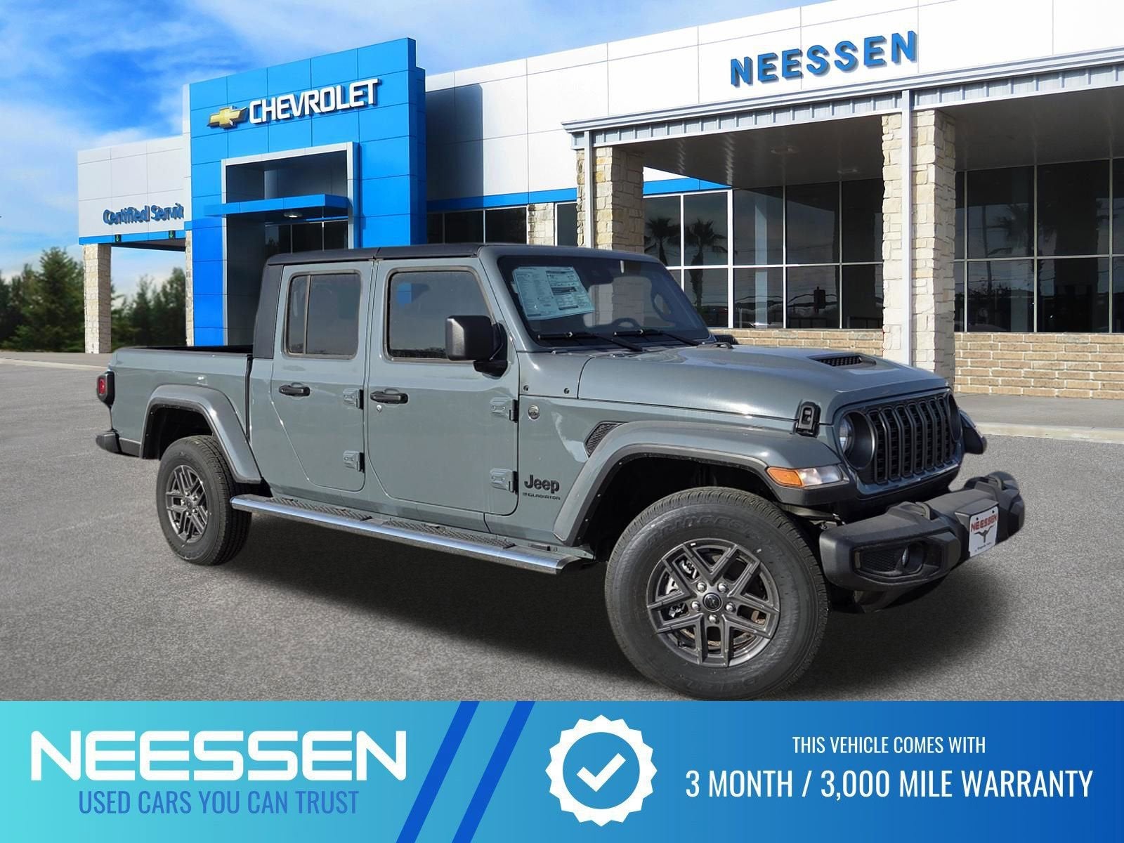 2025 Jeep Gladiator Sport S in Anvil Clearcoat — front three-quarter view
