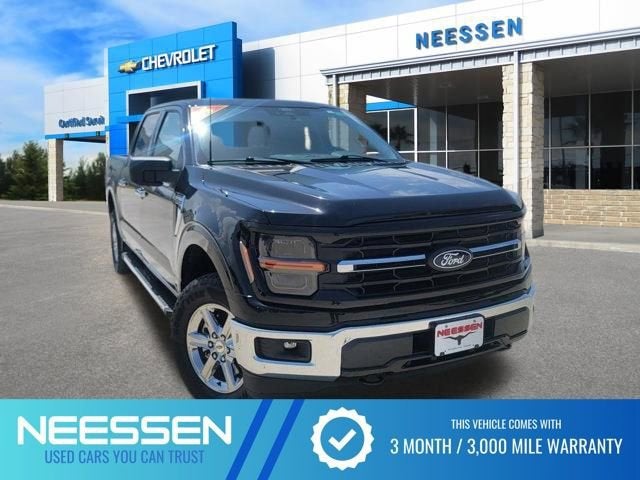 2025 Ford F-150 XLT in Black — front three-quarter view