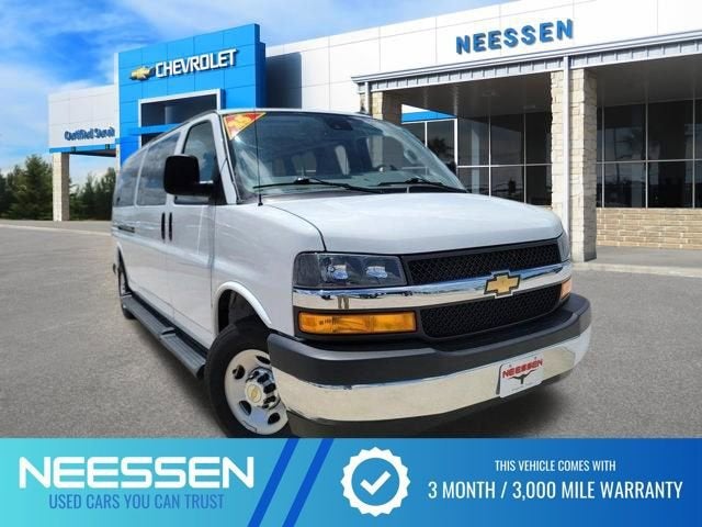 2025 Chevrolet Express Passenger 1LT in Summit White — front three-quarter view