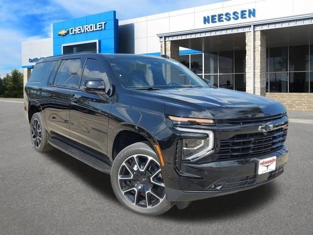 2026 Chevrolet Suburban RST in Black — front three-quarter view