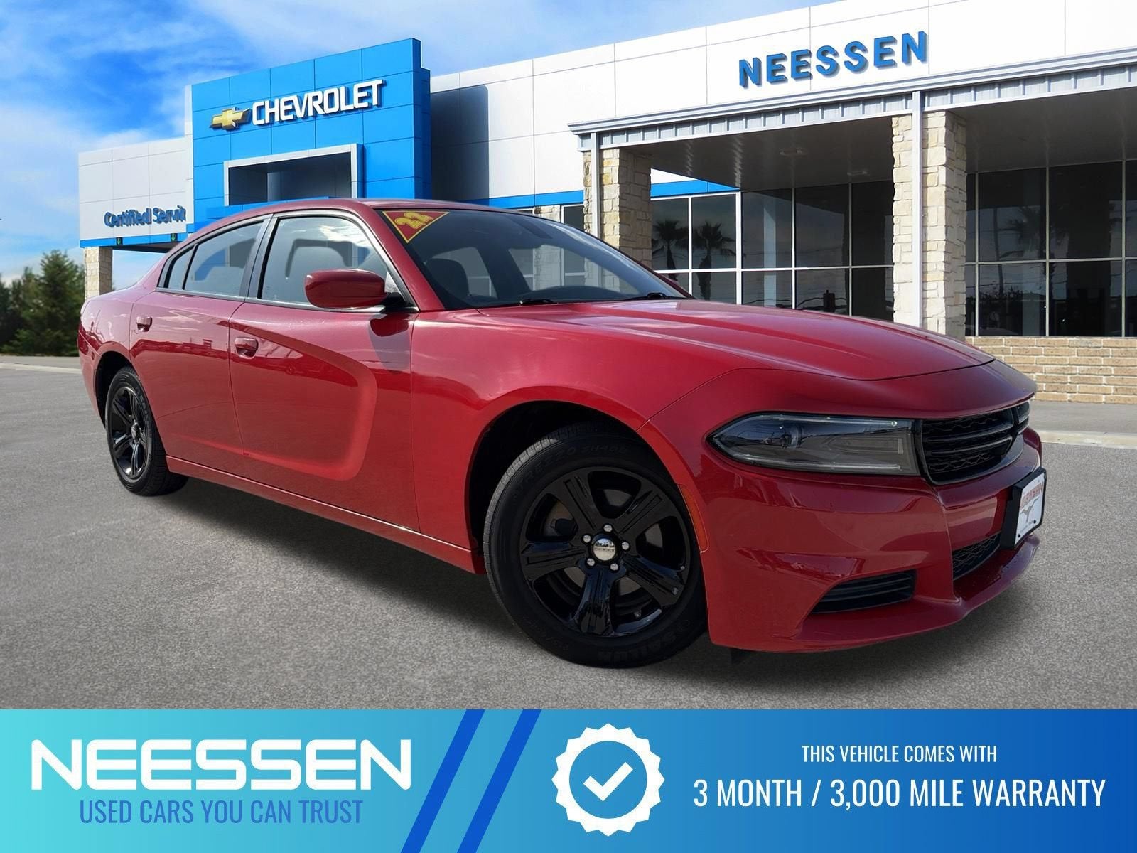 2022 Dodge Charger SXT in Torred Clearcoa — front three-quarter view