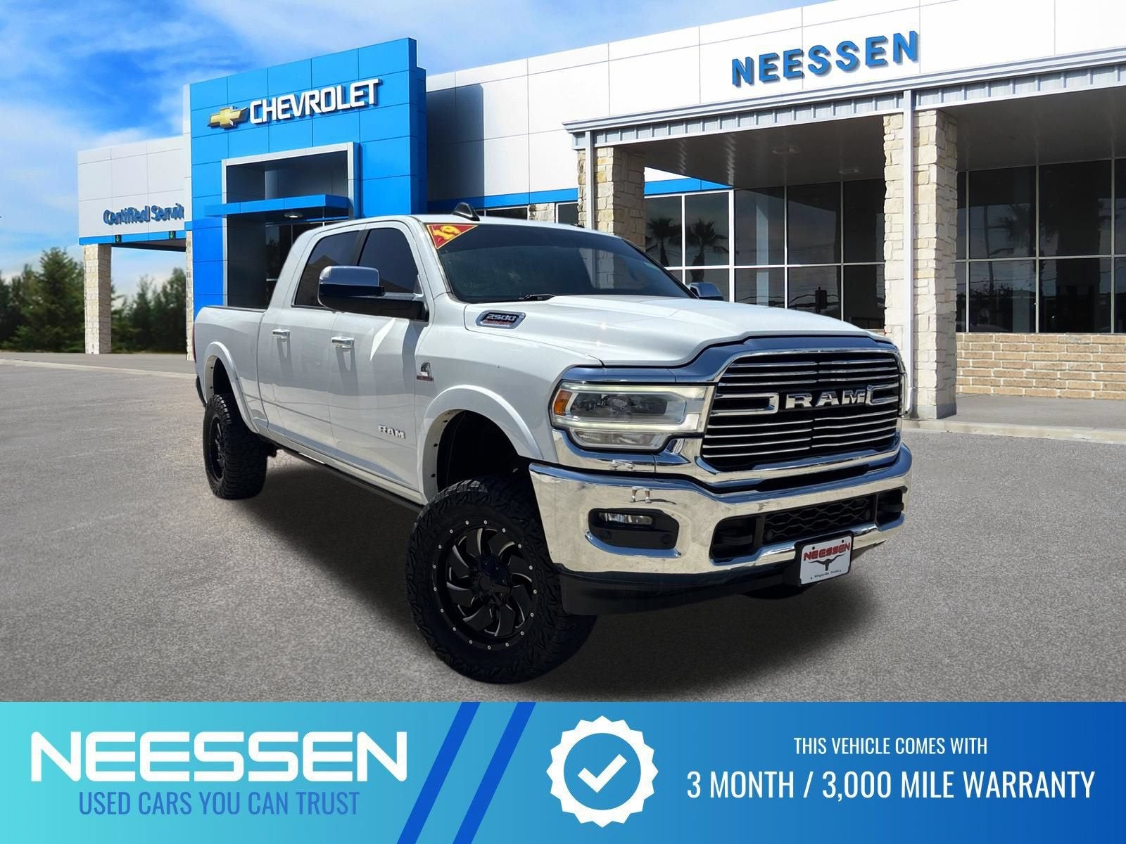 2019 RAM 2500 Laramie in White — front three-quarter view
