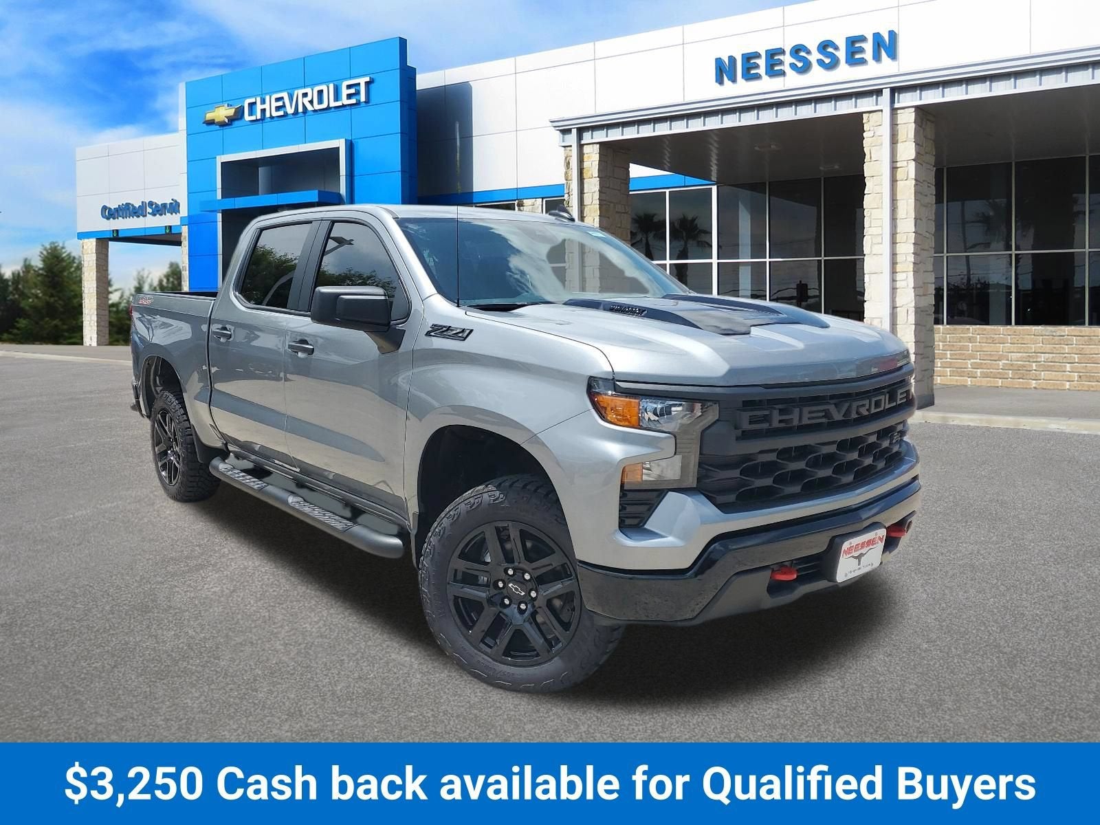 2026 Chevrolet Silverado 1500 Custom Trail Boss in Sterling Gray Metallic — front three-quarter view