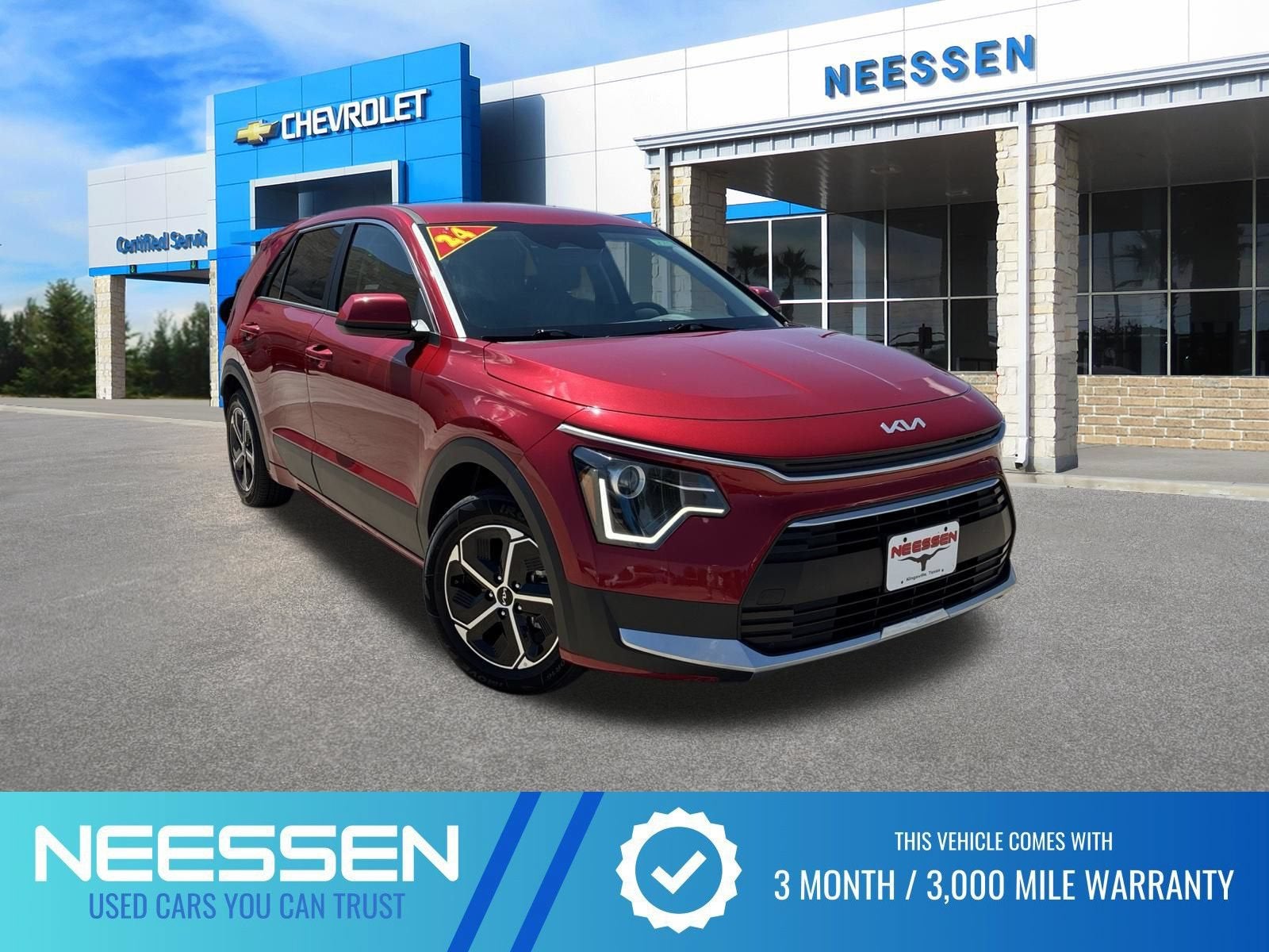 2024 Kia Niro LX in Runway Red — front three-quarter view